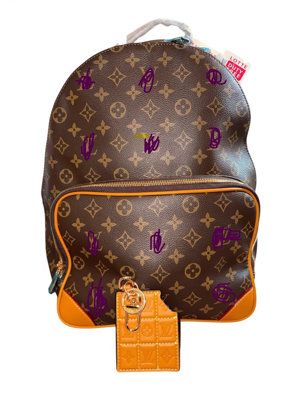 Brown Monogram Backpack with Orange Trim and Tag